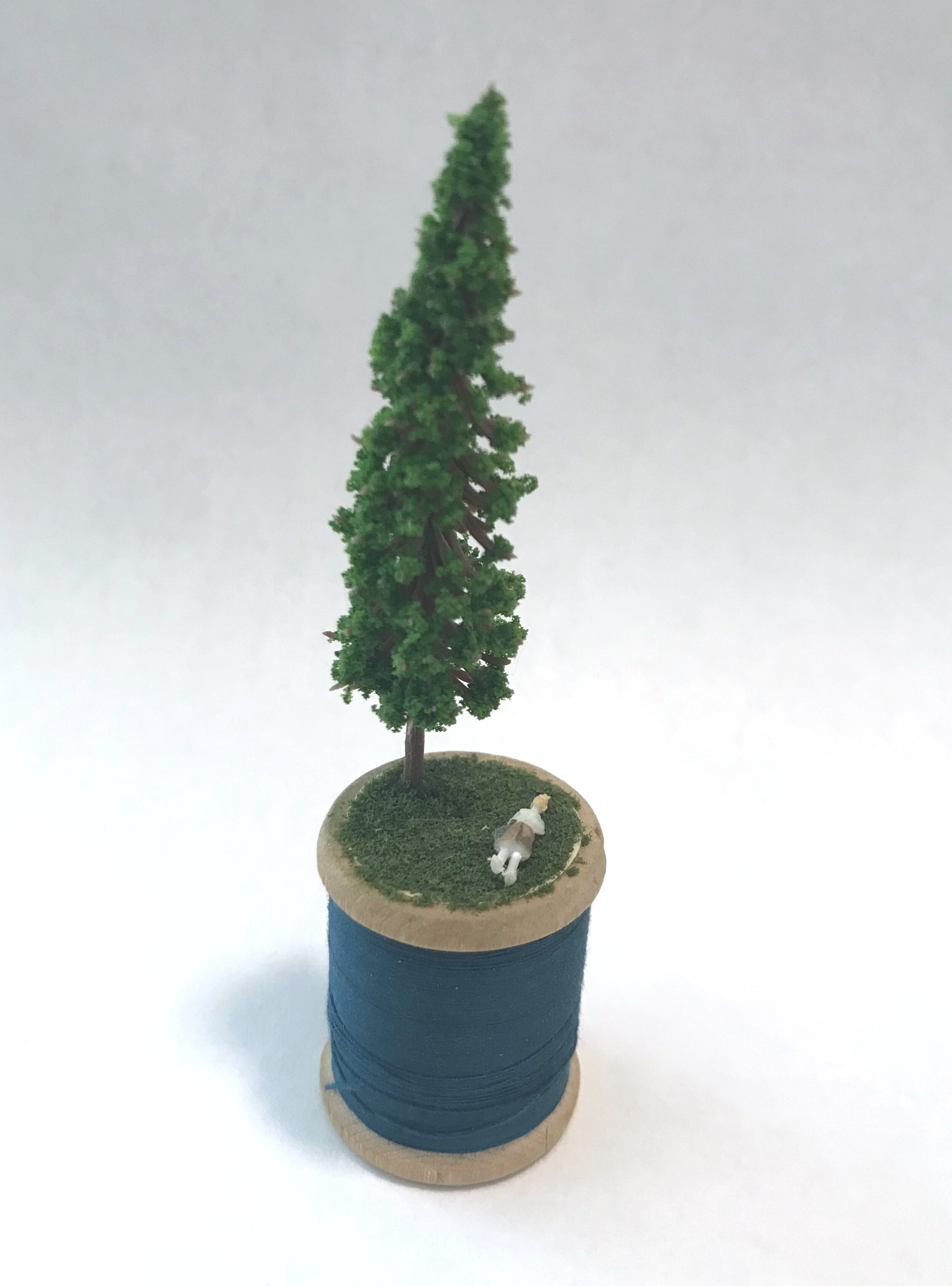  Small Moment (2020). Mixed media on a spool of thread. 2.5” x 0.75” x 0.75”. 